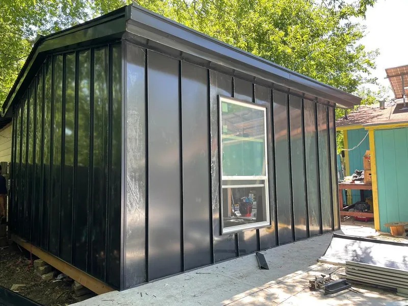 Black standing seam metal wall panels for Roof Inspection in Maili